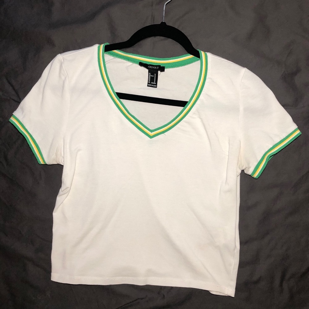 White crop top with green and yellow lining